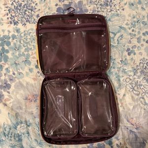 Victoria’s Secret travel case with removable pouches.